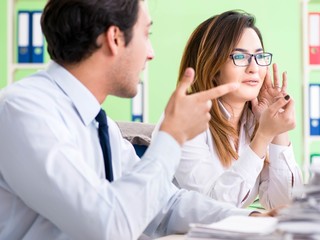 Two colleagues working in the office