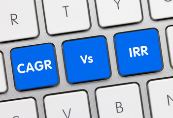 CAGR Vs IRR - Inscription on Blue Keyboard Key.