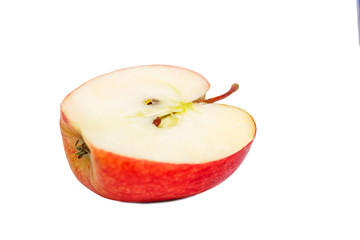 Half a juicy red apple. Isolated on a white background. Close-up. Healthy eating and vegetarianism.