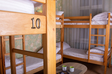 Fototapeta na wymiar big light room with bunk beds and little table