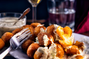 Fried mozzarella cheese balls mozarella fritta, appetizer.