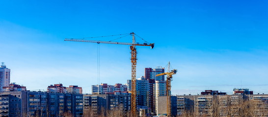 Urban landscape with a tower crane