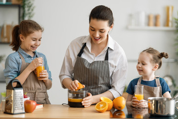 Happy family in the kitchen.