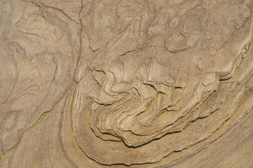 Texture of washed rock, stone. Orange. Wavy, for design.