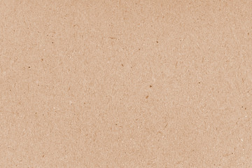 Cardboard grunge recycled craft paper texture with fiber and grain. Brown grainy corrugated cardboard surface. Beige carton plain surface. Grain paper texture. Paper box for packing