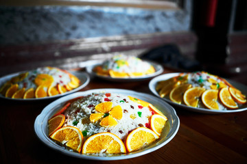 Kolivo is a funeral meal in orthodox churches. Rice porridge garnished with candied fruit and orange slices. Theodore Tyron's day in the first Saturday of Orthodox Great Lent