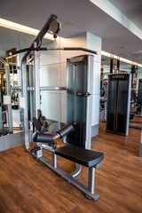 gym exercise machine in fitness room .