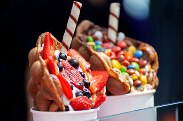 Delicious sweet bubble waffle on table