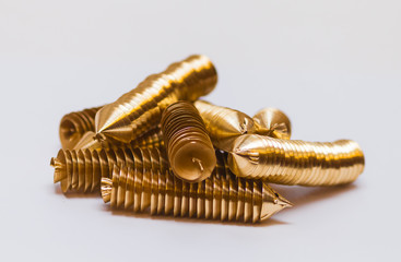 Brass shavings on white background