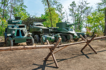 Soviet World War II military equipment - armored car BA, Katyusha rocket launcher based american lend-lease truck Studebaker US6, light tank BT-5 and sidecar motorcycle