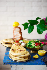Arabian flatbread, with vegetables salad.