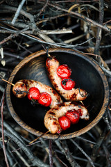grilled sausages with cherry tomato.style rustic