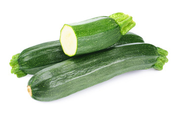 fresh green zucchini isolated on white background