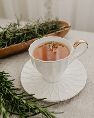Rosemary Tea in white cup