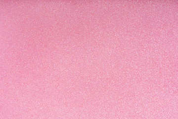 Holiday glowing pink sparkle backdrop. Abstract vibrant festive defocused light. Festive glitter christmas background.