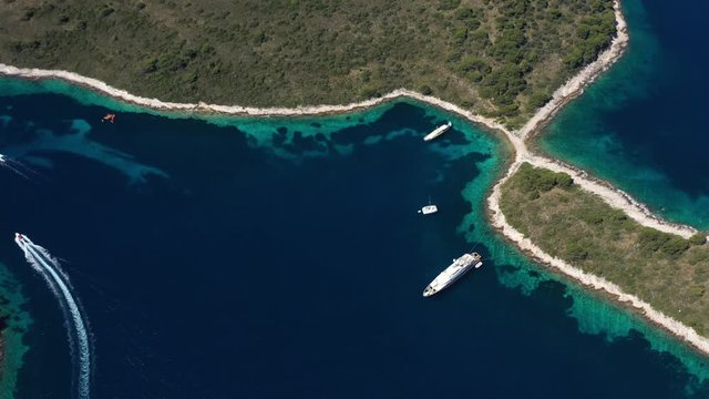 Paklinski Islands near City of Hvar in Croatia, beautiful Aerial Top Down View with Yachts an Sailboats on the Tirkiz Blue Sea