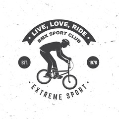 Bmx extreme sport club badge. Vector. Concept for shirt, logo, print, stamp, tee with man ride on a sport bicycle. Vintage typography design with bmx cyclist silhouette.