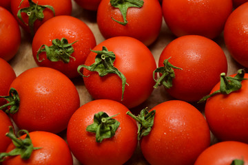 Tomatoes from farmers market. Fresh red tomato. Pickle cucumbers. Organic vegetables. Salad ingredients.