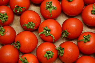 Tomatoes from farmers market. Fresh red tomato. Pickle cucumbers. Organic vegetables. Salad ingredients.