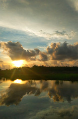 Fototapeta premium sunset over the river