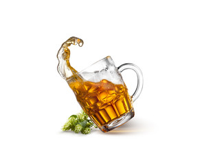 Glass of beer on wooden table with sea on background