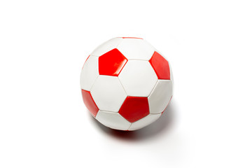 Soccer ball on a light isolated background. Concept game for children, football, physical development. Flat lay, top view