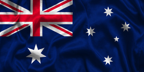 Australia national flag background with fabric texture. Flag of Australia waving in the wind.
