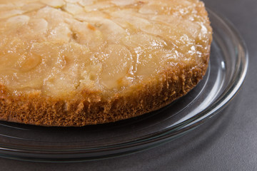 Homemade apple pie on a stone countertop. Appetizing breakfast, author's recipe.