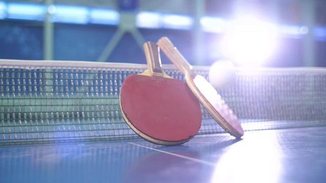 Table tennis paddles and jumping balls