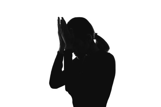 black and white image of a woman's silhouette, portrait, headache, domestic violence