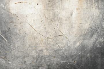 scratched metal background. poured paint. metal texture can be used as background