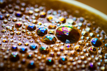 Bubbles in the coffee cup, macro shot of bubbles in the coffee cup. Morning happiness in a cup.