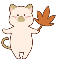 紅葉したモミジを持った猫