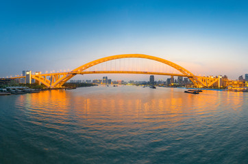 Fototapeta na wymiar Night view of Lupu Bridge, Huangpu River, Shanghai, China
