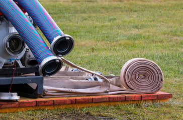 fire rescue hoses on the grass