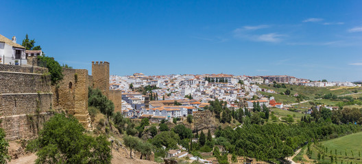 Fototapeta na wymiar Panorama of the city wall and surrounding landscape of Ronda, Spain