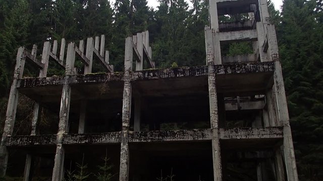 danger weathered abandoned ore mine concrete skeleton in Krusne hory in czech republic