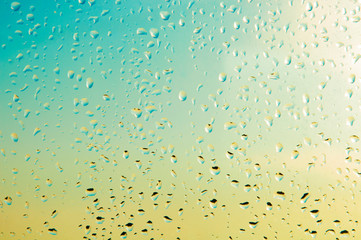 Raindrops or steam shower, on a transparent glass background. Realistic clean drops flow down.