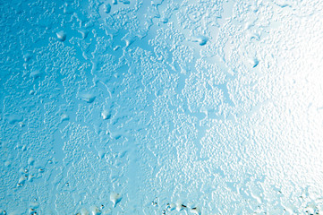 Blue water drops background. water drop background. Drops of water on glass.  Drops of water on a blue background