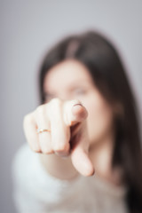 girl shows a finger on you