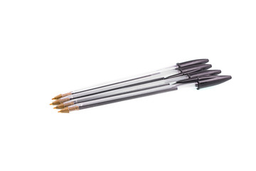 black plastic pens on a white isolated background