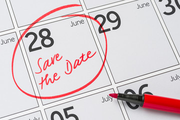Save the Date written on a calendar - June 28 - obrazy, fototapety, plakaty