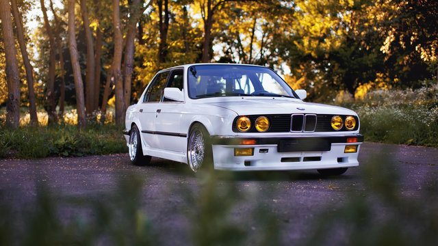 BMW M3 e30 outdors, sport wheels, tunning, glossy and shiny old classic retro oldtimer.