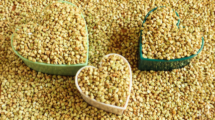 Heart made of green buckwheat. Symbol of love and health. Great food. healthy groats. Organic raw...
