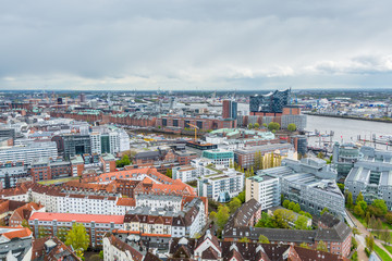 Fototapeta premium Aerial view of downtown of Hamburg, Germany, view from the clock tower of Church of St. Michael. A landmark of the city and considered to be one of the finest Hanseatic Protestant baroque churches