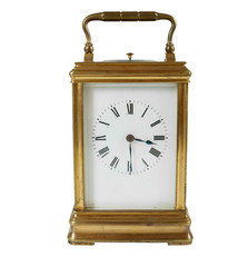 golden carriage clock isolated on white background