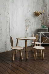 Panoramic close-up of wooden desk space made from environmentally friendly wood in  room arranged in natural colours and materials