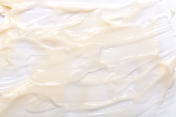 Beige texture of cream background. Smear of cosmetic cream