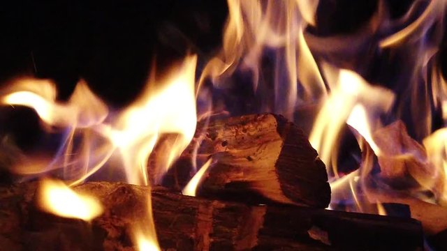 Wood logs on fire, slow motion