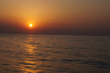 beautiful sunrise and ship on sea 